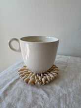 Load image into Gallery viewer, Cowrie Shell Trivet
